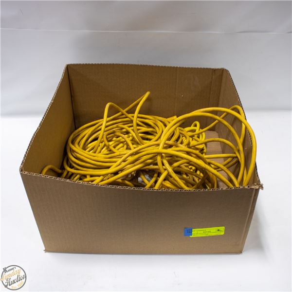 BOX OF YELLOW EXTENSION CORDS VARIOUS LENGTHS