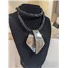 Image 2 : HAND HAMMERED SILVER PENDANT, MARKED HAND WRITING LIVING STONE W/ BLACK CORD NECKLACE