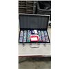 Image 3 : CASED POKER CHIP SET AND SET OF SNOWSHOES