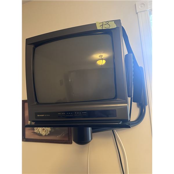 Sharp television with wall mount and remote