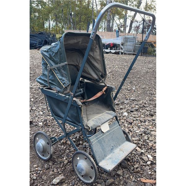 Early Metal and Canvas Baby Doll Stroller with Foldable Hood and Four Wheels