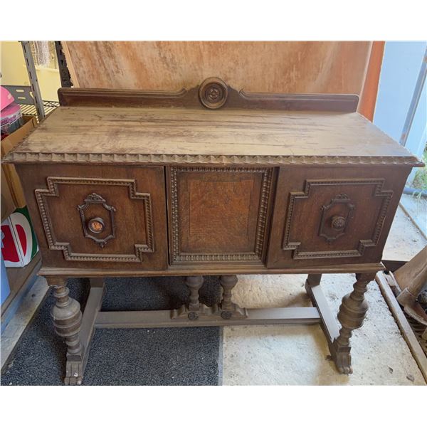 Ornate Wooden Sideboard Buffet with Decorative Carvings and Storage Compartments