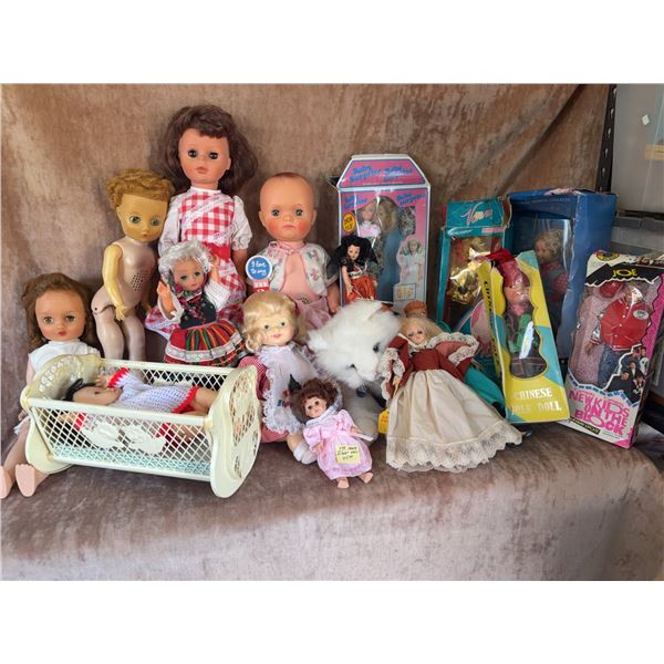 Vintage and Modern Dolls Including Baby Surprise, Barbie, and NKOTB