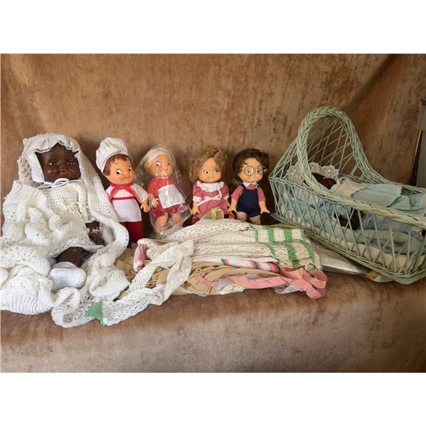 6 Dolls Including African American Baby Dolls, Wicker Basket, and Handmade Linens