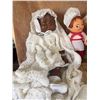 Image 5 : 6 Dolls Including African American Baby Dolls, Wicker Basket, and Handmade Linens