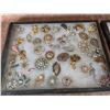 Image 2 : Rhinestone Brooches and Costume Jewelry with Bracelets and Necklaces in Display Cases
