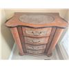 Image 2 : Small Wood Chest of Drawers with Carved Details and Abstract Wall Art