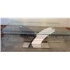 Image 2 : Glass Coffee Table with Black and White Curved Base and Rectangular Metal Platform