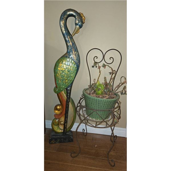 Painted Peacock Sculpture and Wrought Iron Plant Stand With Green Planter Pot