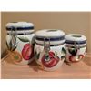 Image 7 : Kitchen Decor: Cookie Jar, Ceramic Canisters, Brass Swans, Wall Art & Glass Jars