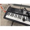 Image 5 : Alesis Harmony 61 Portable 61-Key Keyboard w/ Stand, Microphone & Power Adapter