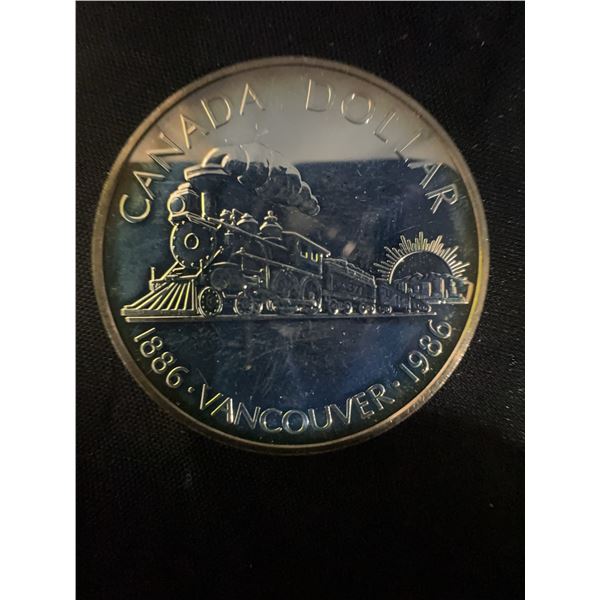1986 Vancouver Centennial 23g .500 Silver Canada Dollar Coin with Locomotive Design