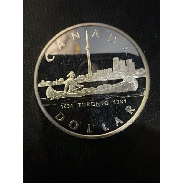 1984 Canada Dollar, 23g .500 Silver Coin, Toronto Skyline Canoe Design, Elizabeth II Obverse