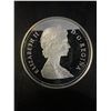 Image 2 : 1984 Canada Dollar, 23g .500 Silver Coin, Toronto Skyline Canoe Design, Elizabeth II Obverse
