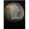 Image 2 : Canada 1973 Silver Dollar 23g .500 Silver RCMP Centennial Queen Elizabeth II Commemorative