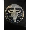 Image 1 : 1982 Canada Regina Dollar, 23g .500 Silver, Queen Elizabeth II/Skull and Parliament Building
