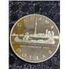 Image 1 : 1984 Toronto Canada Silver Dollar, 500 Silver, 23g, Canoe Design, Queen Elizabeth II Obverse