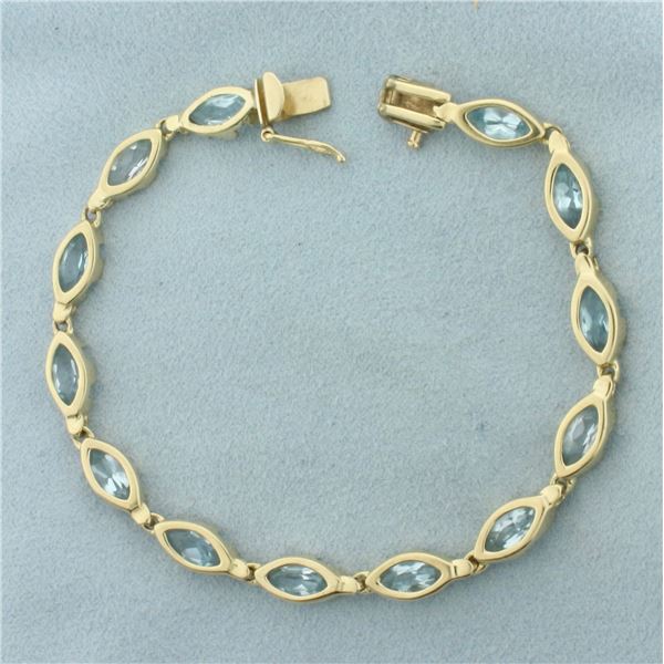 Sky Blue Topaz Tennis Bracelet in 14k Yellow Gold