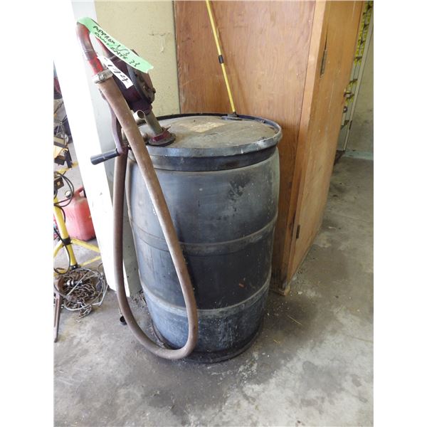 plastic barrel with barrel pump - contents Unknown Most Likely Old fuel