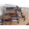 Image 6 : pipe wrenches , pry bars , hammers ,  etc