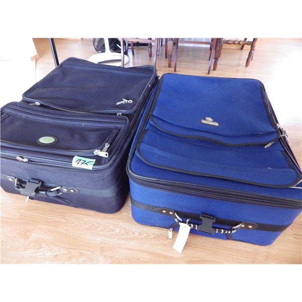 lot of 2 larger suitcases