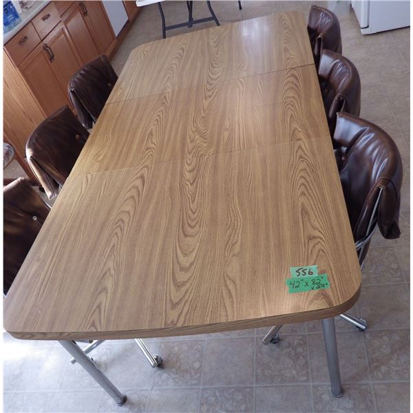 Kitchen table w/ 2 leaves and 6 chairs