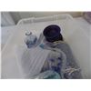 Image 1 : plastic container with decorative candles etc