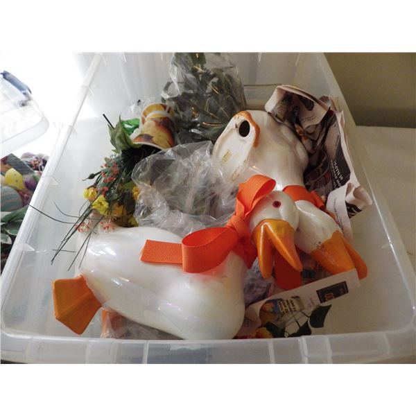 plastic container with ceramic geese and silk flowers etc