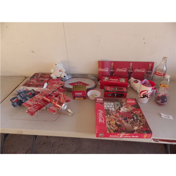lot of Coca Cola memorabilia