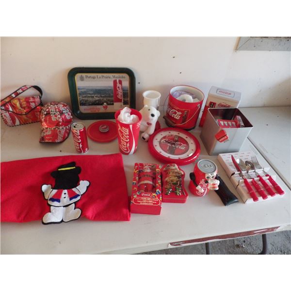 lot of Coca Cola memorabilia