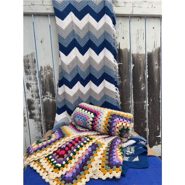 Two Crocheted Blankets with Chevron and Granny Square Patterns