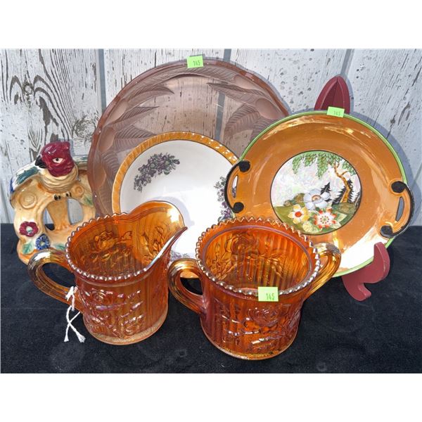Carnival Glass Creamer and Sugar Bowls, Hand-Painted Plates, and Parrot Figurine