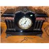 Image 1 : Black Mantel Clock with Ornate Detailing, Marble Accents, and Wind-Up Key