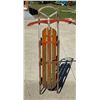 Image 4 : VINTAGE HIAWATHA WOODEN AND METAL SNOW SLED WITH A STEERING CROSSBAR