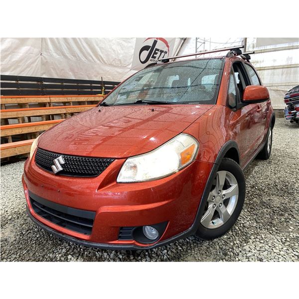PARKSVILLE - 2010 SUZUKI SX4 ORANGE  129491 KMS - 300182-3