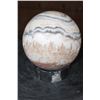 Image 4 : Big Polished SPIRIT STONE Mineral Sphere with an Orthoceras Fossil Stand