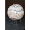 Image 5 : Big Polished SPIRIT STONE Mineral Sphere with an Orthoceras Fossil Stand