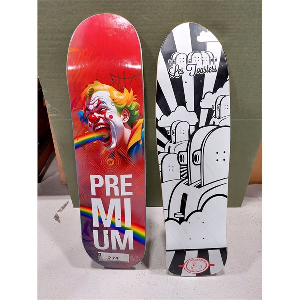 LOT DE 2 PLANCHES DE SKATE ASSORTIES PREMIUM SKATEBOARDS ET LES TOASTERS, (NEUVES)