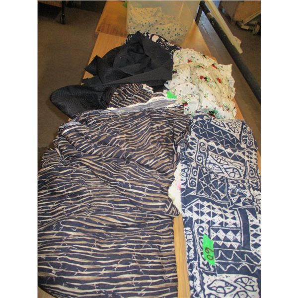 UNCLAIMED STORAGE:  2 CU. FT RUBBERMAID TOTE C/W ASSORTED FABRIC