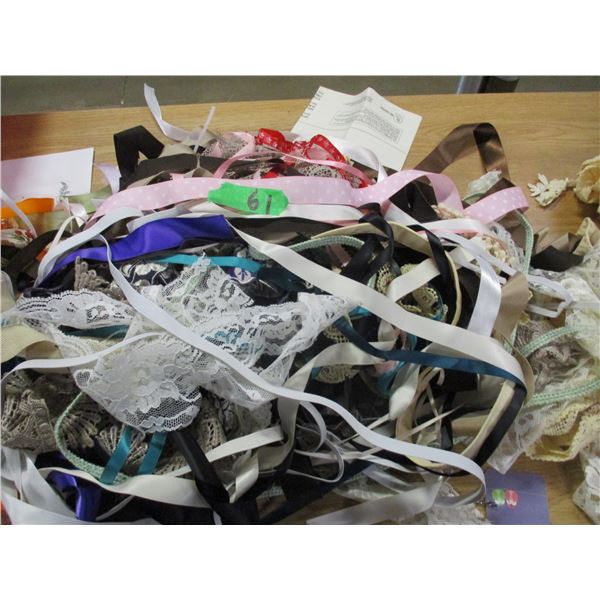 UNCLAIMED STORAGE:  1 CU. FT RUBBERMAID TOTE C/W ASSORTED FABRIC