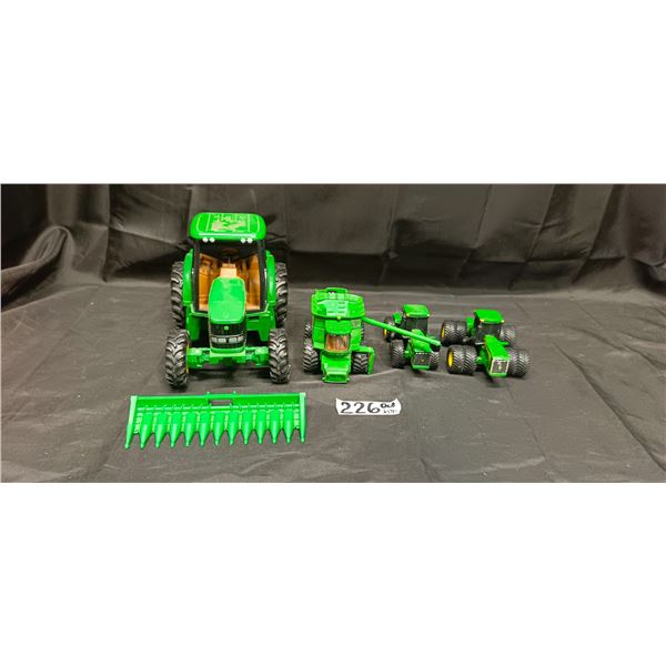 Lot of (4) John Deere Toys (3 tractors, 1 combine)