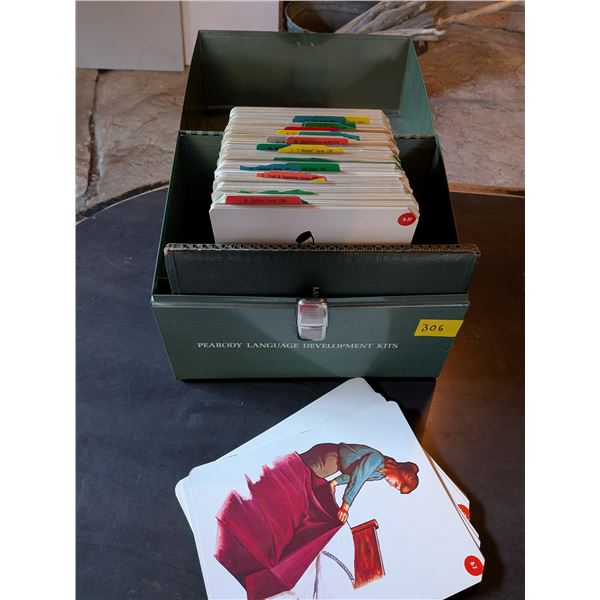 Vintage Peabody Language Development Kit in a green metal case, filled with categorized full-colour 