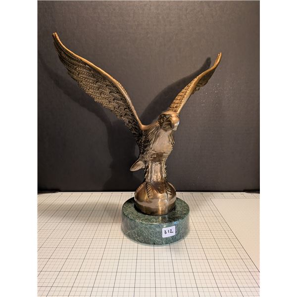 Heavy cast brass eagle sculpture on green marble base. Great condition.