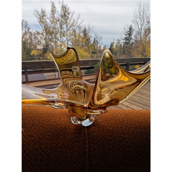 Large amber-honey handblown Art Glass in great condition. About 24-inch long.