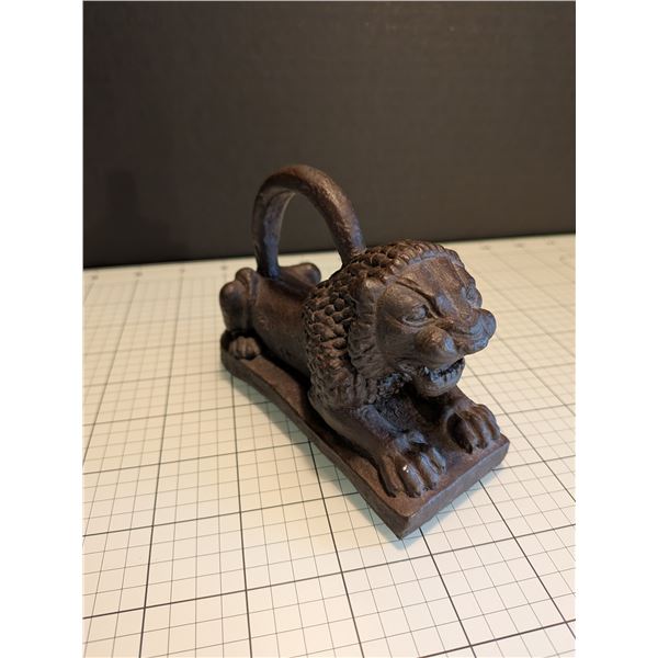 Assyrian lion weight replica with felted base in great condition.