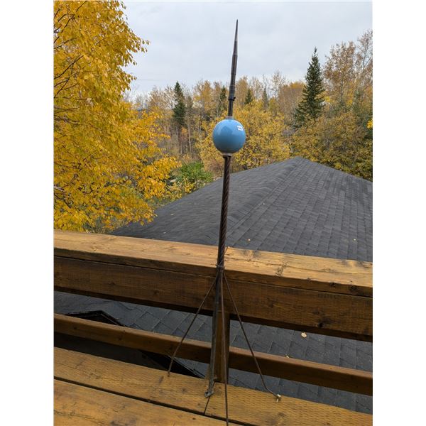 Vintage lightning rod with Dodd & Struthers tip and blue glass globe, mounted on a metal tripod. Abo