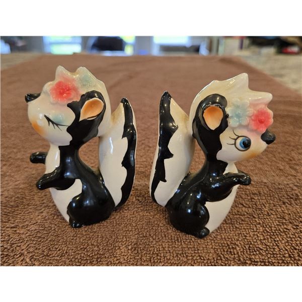 Vintage ceramic skunk salt & pepper shakers.  1950sd or 60s.  Kitschy kitchen decor.  Stamped Japan.