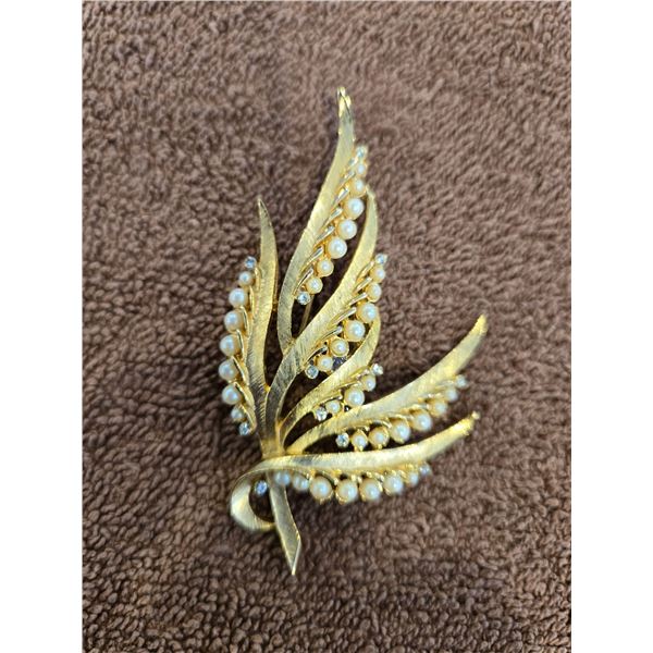 Vintage pearl and rhinestone leaf spray brooch. 3" long.  No missing stones.  No marking