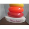 Image 2 : Classic Fisher-Price Rock-a-Stack ring-stacking toy for infants.