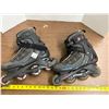 Image 1 : Pair of black and gray Rollerblade Pro 05 inline fitness skates.